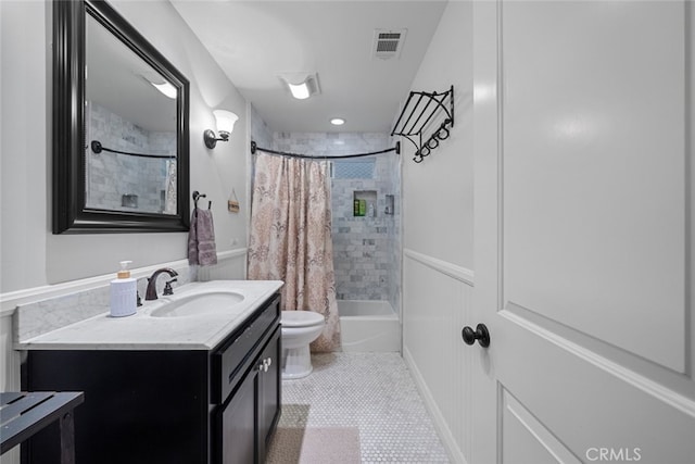 24848 Matterhorn Ct, Crestline, CA 92325 - bathroom featuring vanity, shower / bath combo with shower curtain, tile patterned floors, toilet, and visible vents