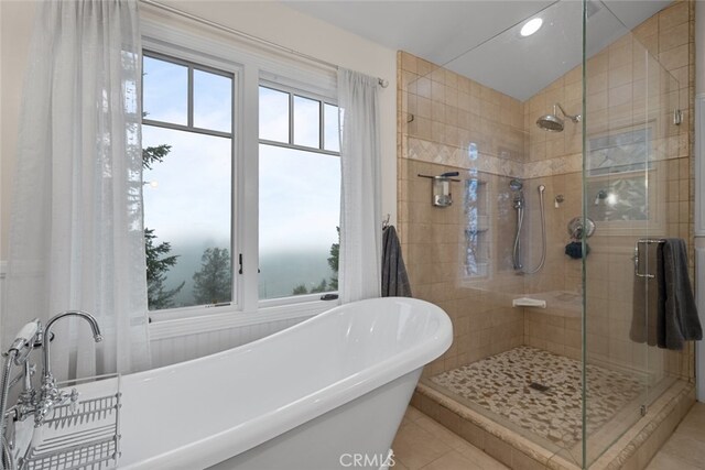 24848 Matterhorn Ct, Crestline, CA 92325 - bathroom with tile patterned flooring, recessed lighting, a freestanding bath, and a stall shower