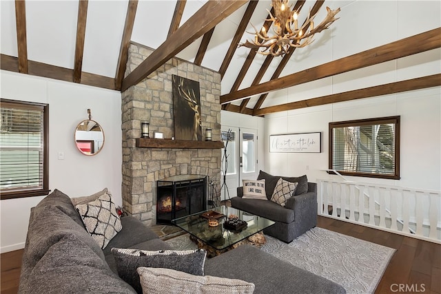 28898 Palisades Dr, Lake Arrowhead, CA 92352 - living room with a fireplace, a chandelier, wood finished floors, beamed ceiling, and high vaulted ceiling