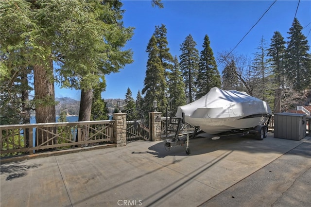 28898 Palisades Dr, Lake Arrowhead, CA 92352 - view of patio featuring a gate and a mountain view