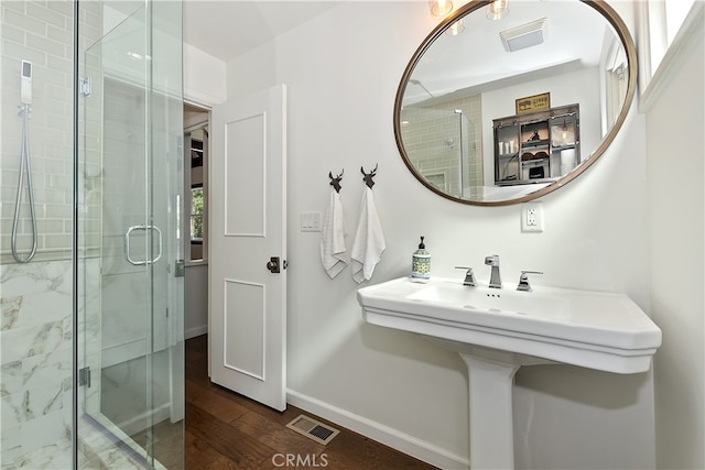 28898 Palisades Dr, Lake Arrowhead, CA 92352 - full bath with a shower stall and wood finished floors