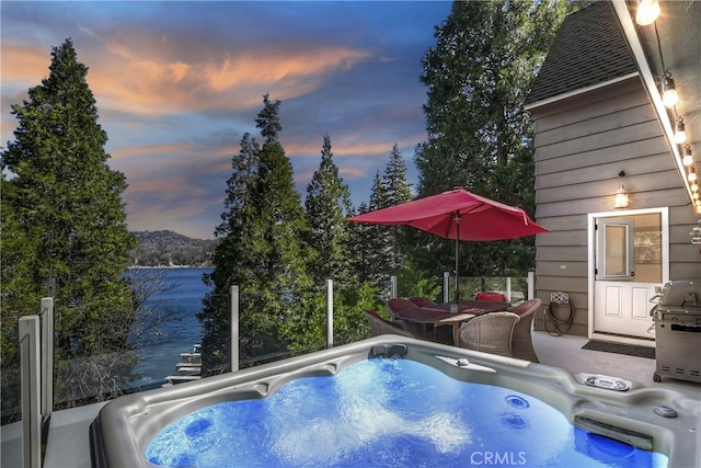 28898 Palisades Dr, Lake Arrowhead, CA 92352 - pool at dusk with a hot tub and a grill