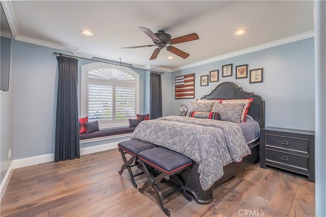 bedroom with recessed lighting, hardwood / wood-style floors, ornamental molding, ceiling fan, and baseboards
