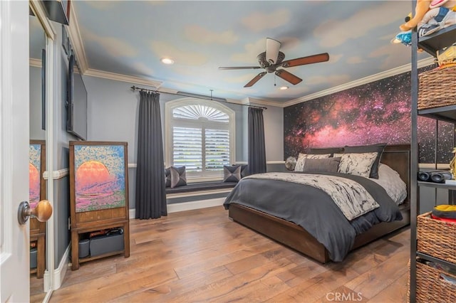 bedroom featuring crown molding, recessed lighting, wood finished floors, and baseboards