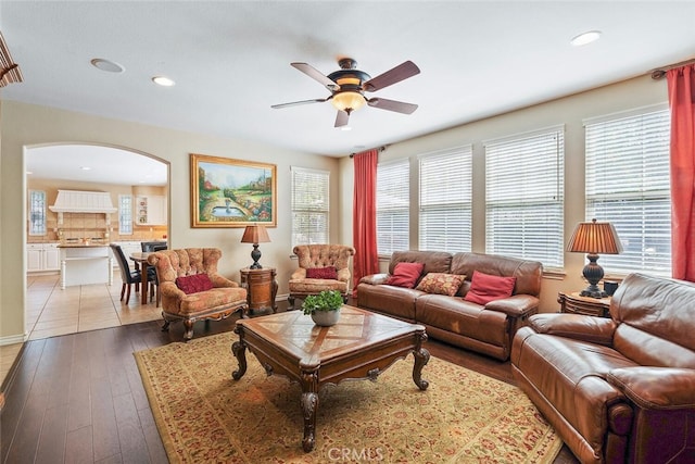 28 Malibu, Irvine, CA 92602 - living area with a ceiling fan, arched walkways, recessed lighting, and dark wood-style flooring