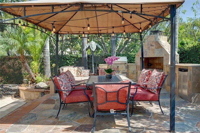 28 Malibu, Irvine, CA 92602 - view of patio / terrace with a gazebo and outdoor dining area