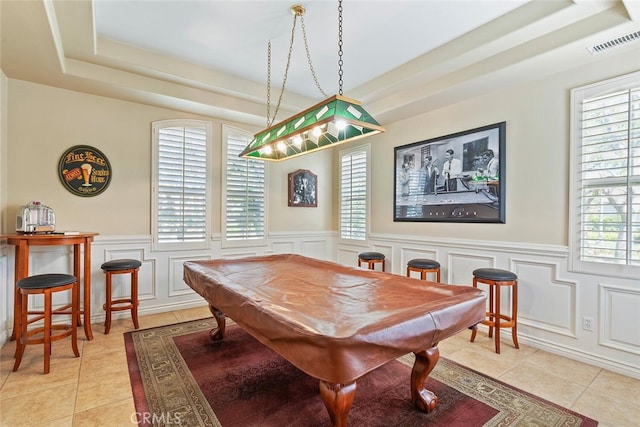 28 Malibu, Irvine, CA 92602 - dining space with a raised ceiling, light tile patterned flooring, a decorative wall, billiards, and wainscoting
