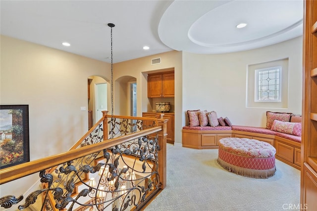 28 Malibu, Irvine, CA 92602 - corridor featuring arched walkways, light colored carpet, an upstairs landing, and recessed lighting