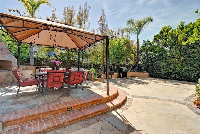 28 Malibu, Irvine, CA 92602 - view of patio / terrace featuring a gazebo, outdoor dining area, and a grill