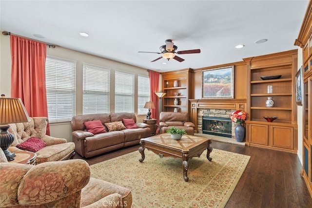 28 Malibu, Irvine, CA 92602 - living area with ceiling fan, dark wood finished floors, a fireplace, recessed lighting, and built in features