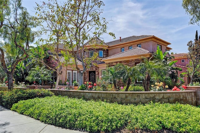 view of front of home featuring stucco siding