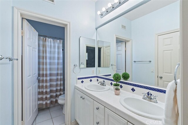 28 Malibu, Irvine, CA 92602 - bathroom with double vanity and tile patterned flooring