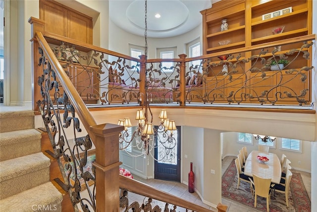 28 Malibu, Irvine, CA 92602 - stairs with a chandelier, plenty of natural light, and tile patterned flooring