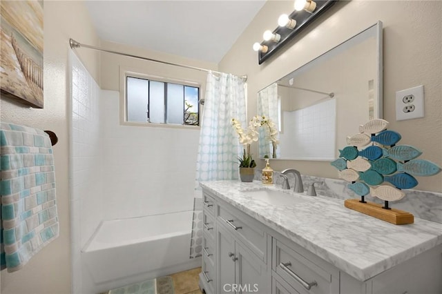 full bath featuring shower / tub combo and vanity