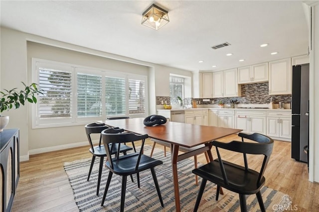 dining area with recessed lighting, visible vents, baseboards, and light wood-style floors