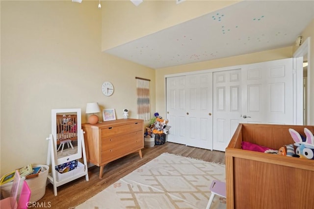 bedroom with a closet and wood finished floors