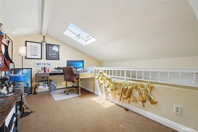 carpeted office featuring lofted ceiling with skylight and baseboards