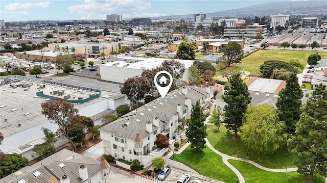 drone / aerial view with a view of city