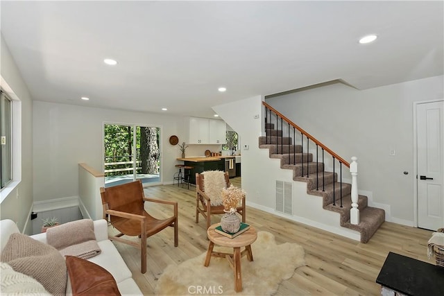 377 Hillside Rd, Lake Arrowhead, CA 92352 - living room with stairway, light wood finished floors, and recessed lighting