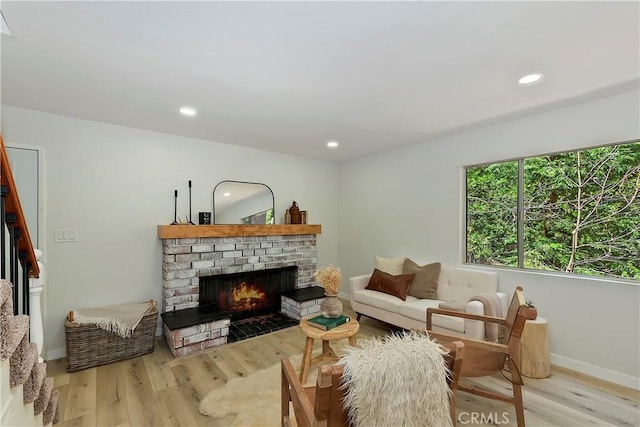 377 Hillside Rd, Lake Arrowhead, CA 92352 - living room featuring wood finished floors, stairs, a fireplace, and recessed lighting