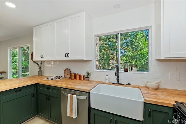 377 Hillside Rd, Lake Arrowhead, CA 92352 - kitchen with butcher block counters, stainless steel dishwasher, green cabinetry, white cabinets, and decorative backsplash