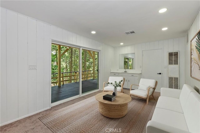 377 Hillside Rd, Lake Arrowhead, CA 92352 - living room with recessed lighting, a heating unit, carpet floors, and a decorative wall