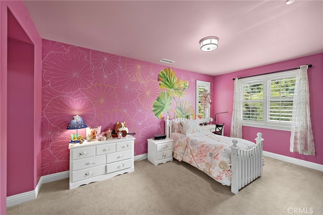 bedroom with baseboards, carpet, and visible vents