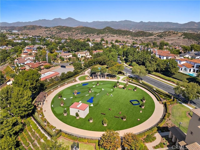 birds eye view of property with a residential view and a mountain view