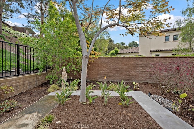 view of yard featuring a fenced backyard