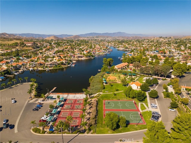 birds eye view of property with a residential view and a water and mountain view
