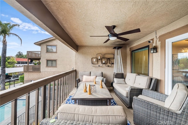 balcony with ceiling fan and outdoor lounge area