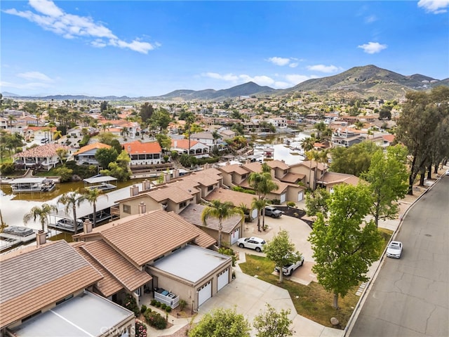bird's eye view with a residential view and a mountain view