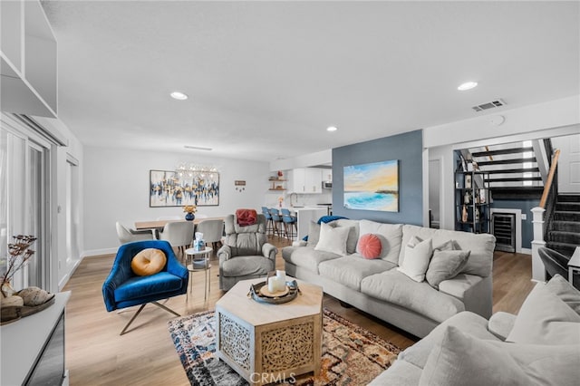 30156 Yellow Feather Dr, Canyon Lake, CA 92587 - living area with light wood-style flooring, stairway, recessed lighting, a chandelier, and baseboards