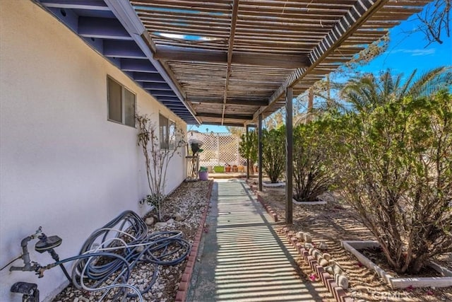 view of patio featuring a pergola