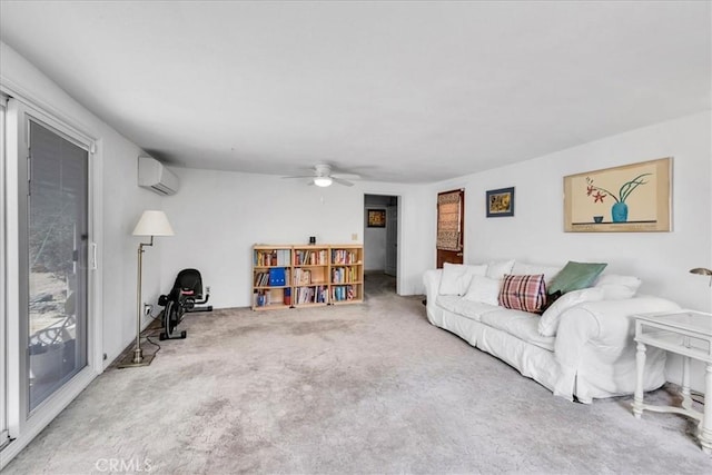 living area featuring a ceiling fan, carpet flooring, and a wall unit AC