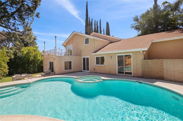 2173 Ranchwood Pl, Riverside, CA 92506 - view of swimming pool featuring a patio and a pool with connected hot tub