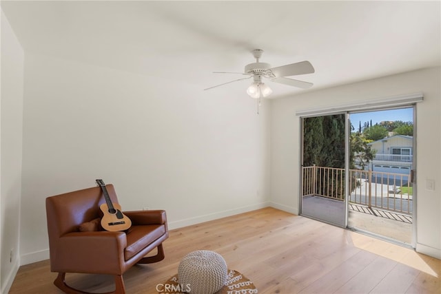 2173 Ranchwood Pl, Riverside, CA 92506 - sitting room featuring wood finished floors, a ceiling fan, and baseboards