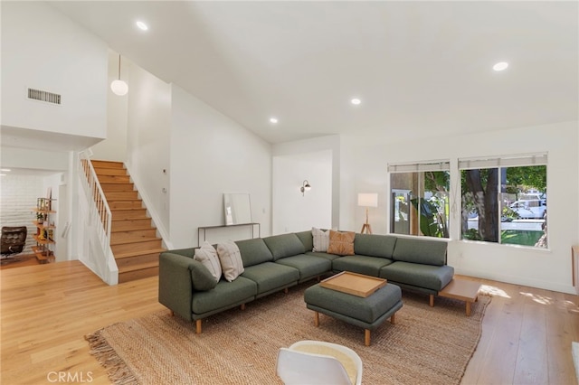 2173 Ranchwood Pl, Riverside, CA 92506 - living area featuring stairs, hardwood / wood-style flooring, and recessed lighting