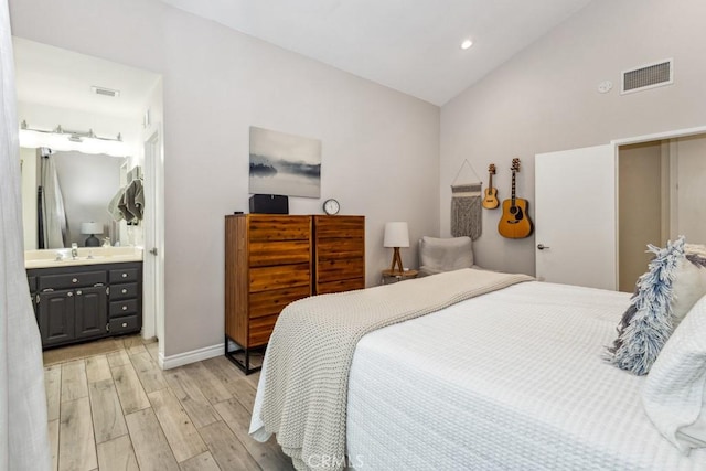 2176 N Pami Cir, Orange, CA 92867 - bedroom with connected bathroom, baseboards, visible vents, and light wood-style floors