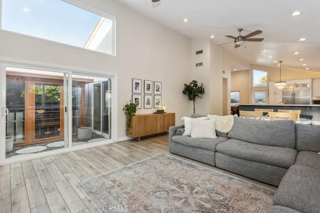 2176 N Pami Cir, Orange, CA 92867 - living room featuring recessed lighting, a ceiling fan, wood finished floors, and high vaulted ceiling