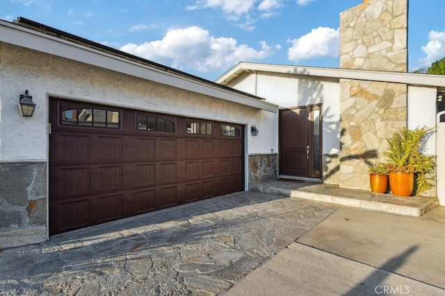 2176 N Pami Cir, Orange, CA 92867 - exterior space with a garage, a chimney, driveway, and stone siding