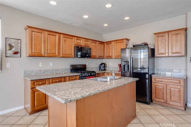 11947 Forest Park Ln, Victorville, CA 92392 - kitchen with a sink, light tile patterned floors, black microwave, gas range oven, and stainless steel fridge with ice dispenser