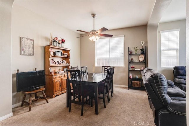 11947 Forest Park Ln, Victorville, CA 92392 - dining area with ceiling fan, baseboards, and light carpet