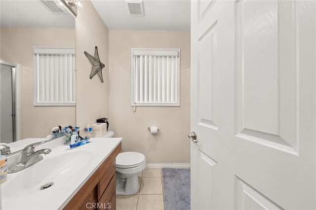 bathroom featuring visible vents, toilet, tile patterned flooring, and vanity