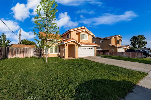 view of front facade with fence, driveway, stucco siding, and a garage