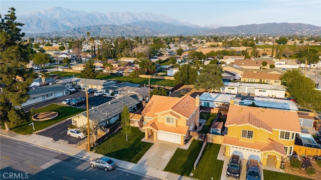aerial view with a residential view and a mountain view