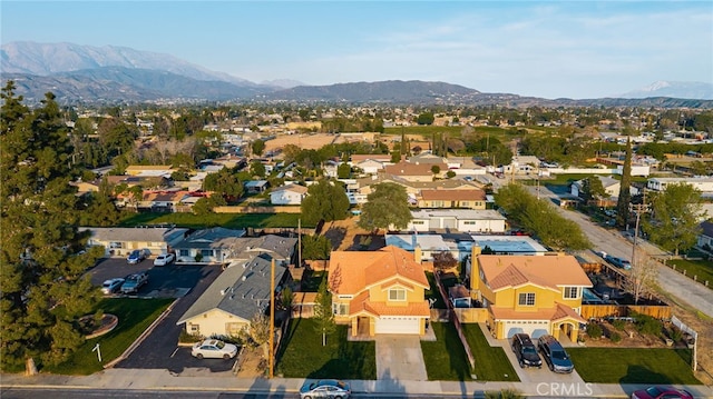 aerial view with a mountain view and a residential view