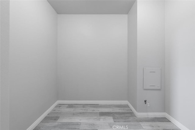 1059 Stowell Ranch Cir, Corona, CA 92881 - empty room featuring light wood finished floors and baseboards