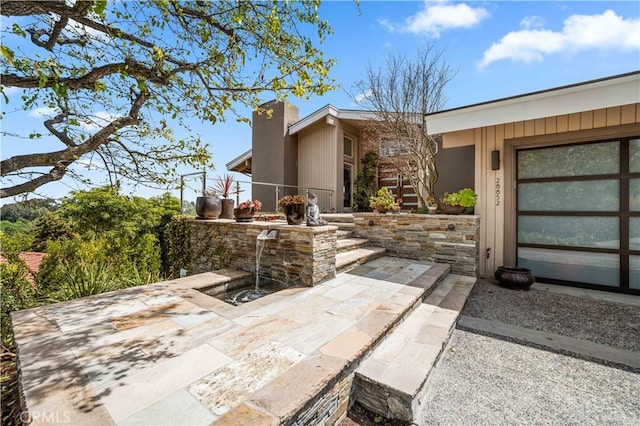 28852 Crestridge Rd, Rancho Palos Verdes, CA 90275 - view of home's exterior with a chimney and a patio area