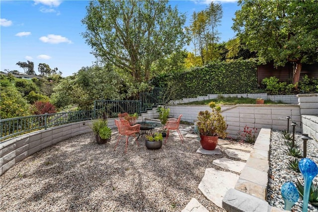 28852 Crestridge Rd, Rancho Palos Verdes, CA 90275 - fenced backyard with a patio area and stairs